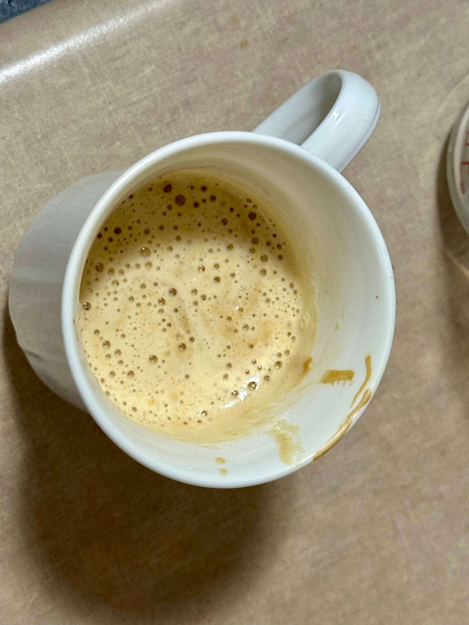 brown sugar nescafe instant coffee recipe Frothy golden hue of instant coffee mixture in a white cup on kitchen counter